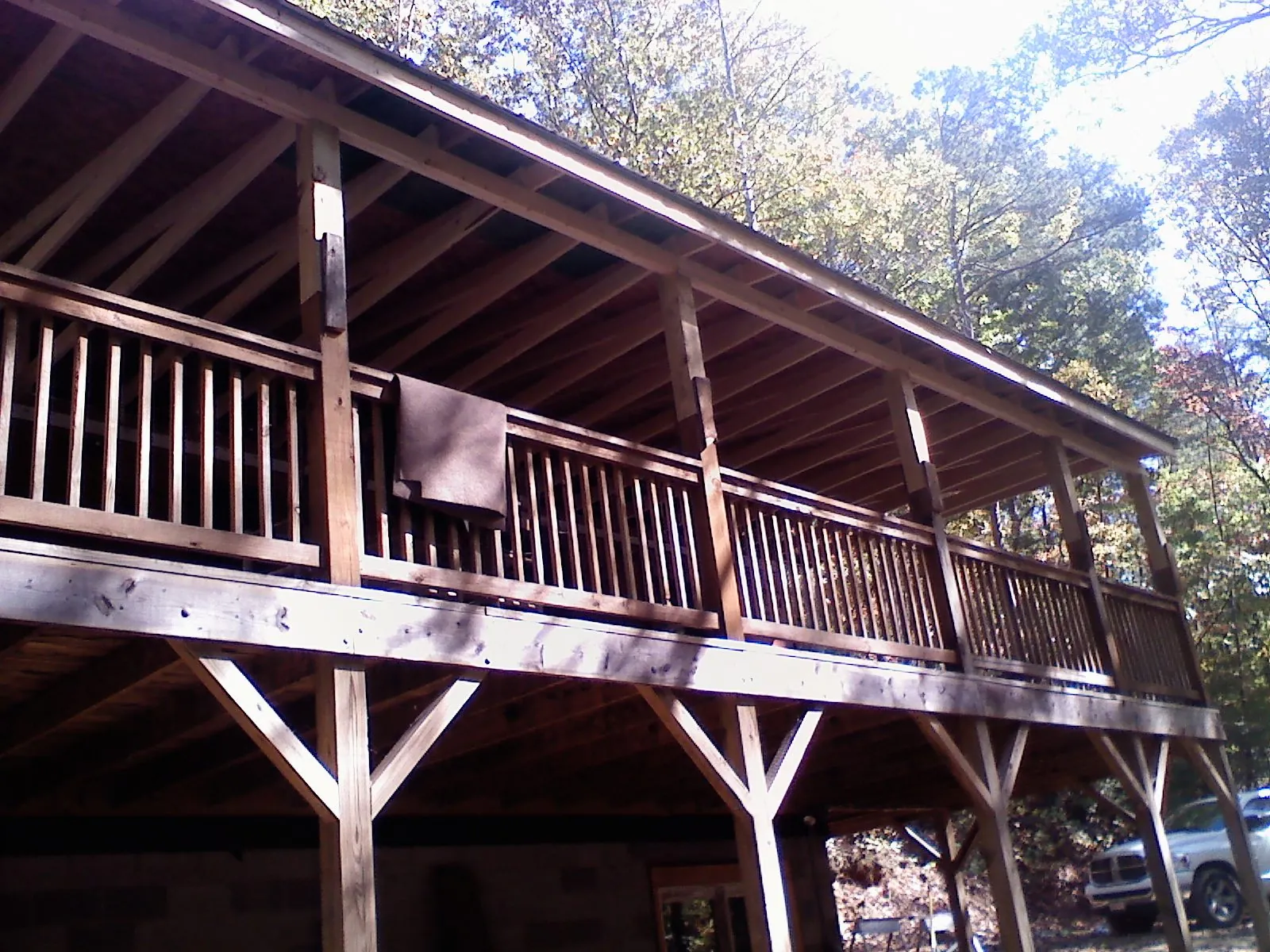 Timber framing under a new elevated porch and deck — Roof Leak Repair in Keithsburg by Roofing Brothers